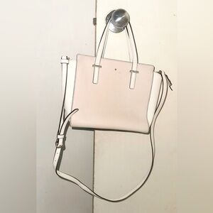 Kate spade leather top-handle with removable crossbody strap.